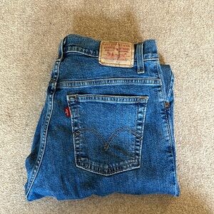 Levi’s Vintage 550 Relaxed Tapered Jeans in Medium Wash